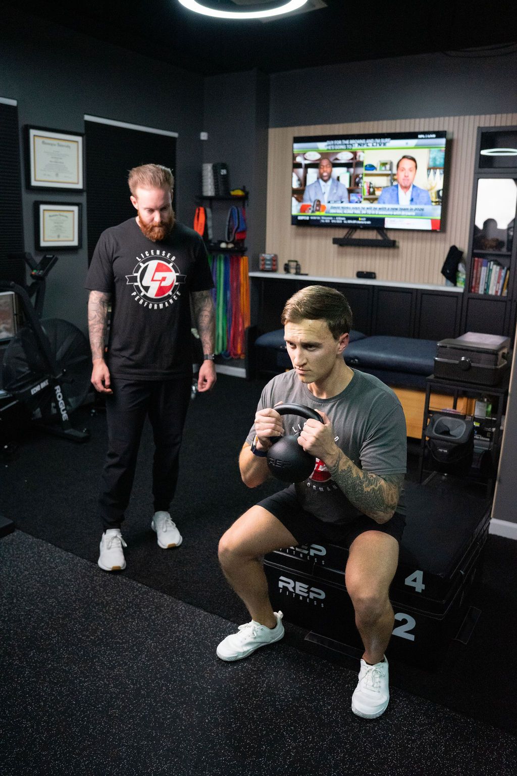 Athlete mid-session running a performance training program.